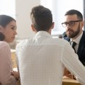 What are at least three major differences between a mortgage broker and a mortgage banker?